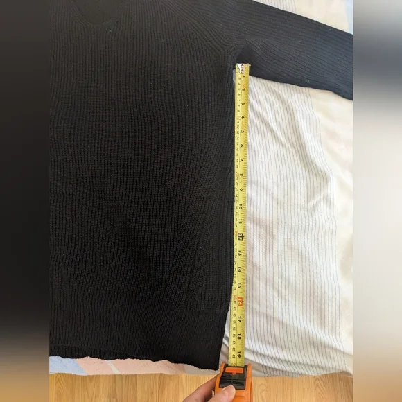 Black Off-the-Shoulder Sweater with Unique Cut-Out Neckline and Fitted Sleeves - Picture 5 of 9